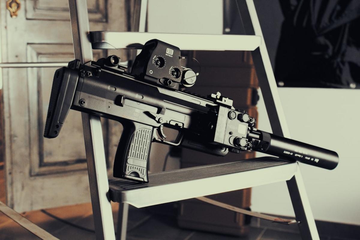 Close-up of Call of Duty weapon with camo pattern in a tactical environment
