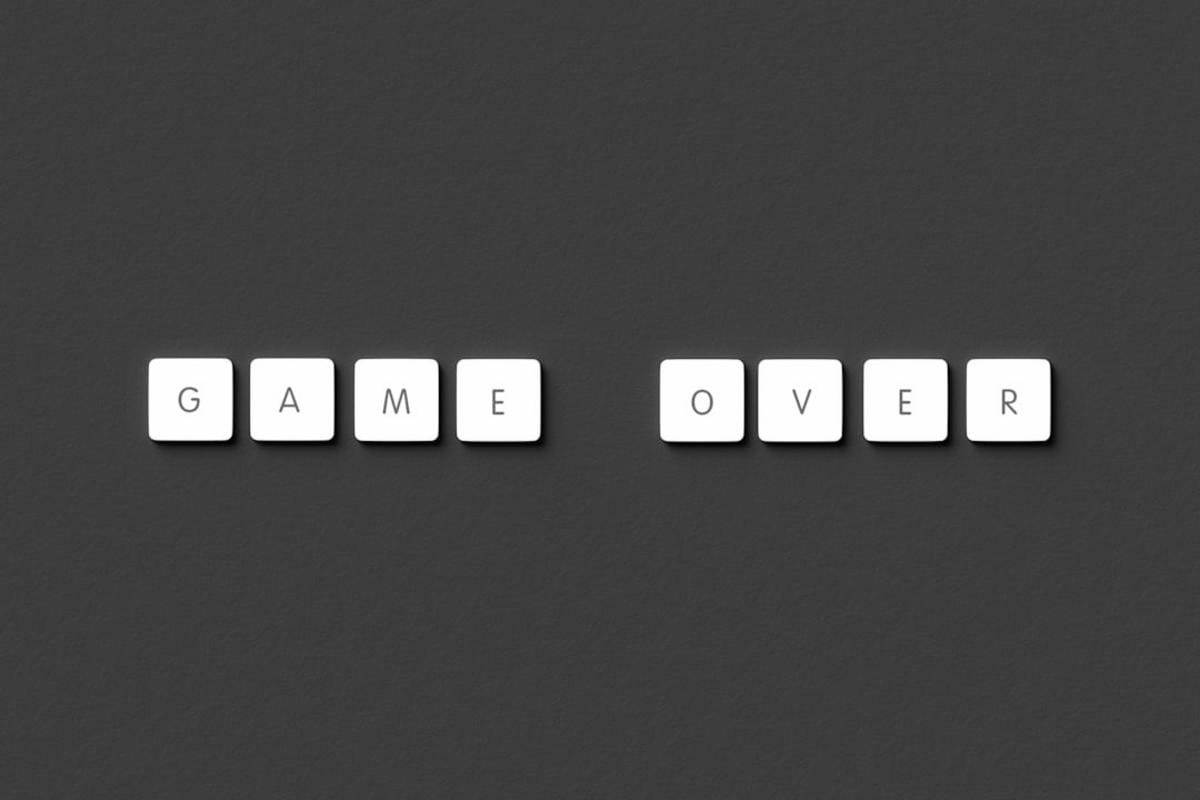 a gamer highlighting a camo collection achievements on a screen with Call of Duty gameplay in the background